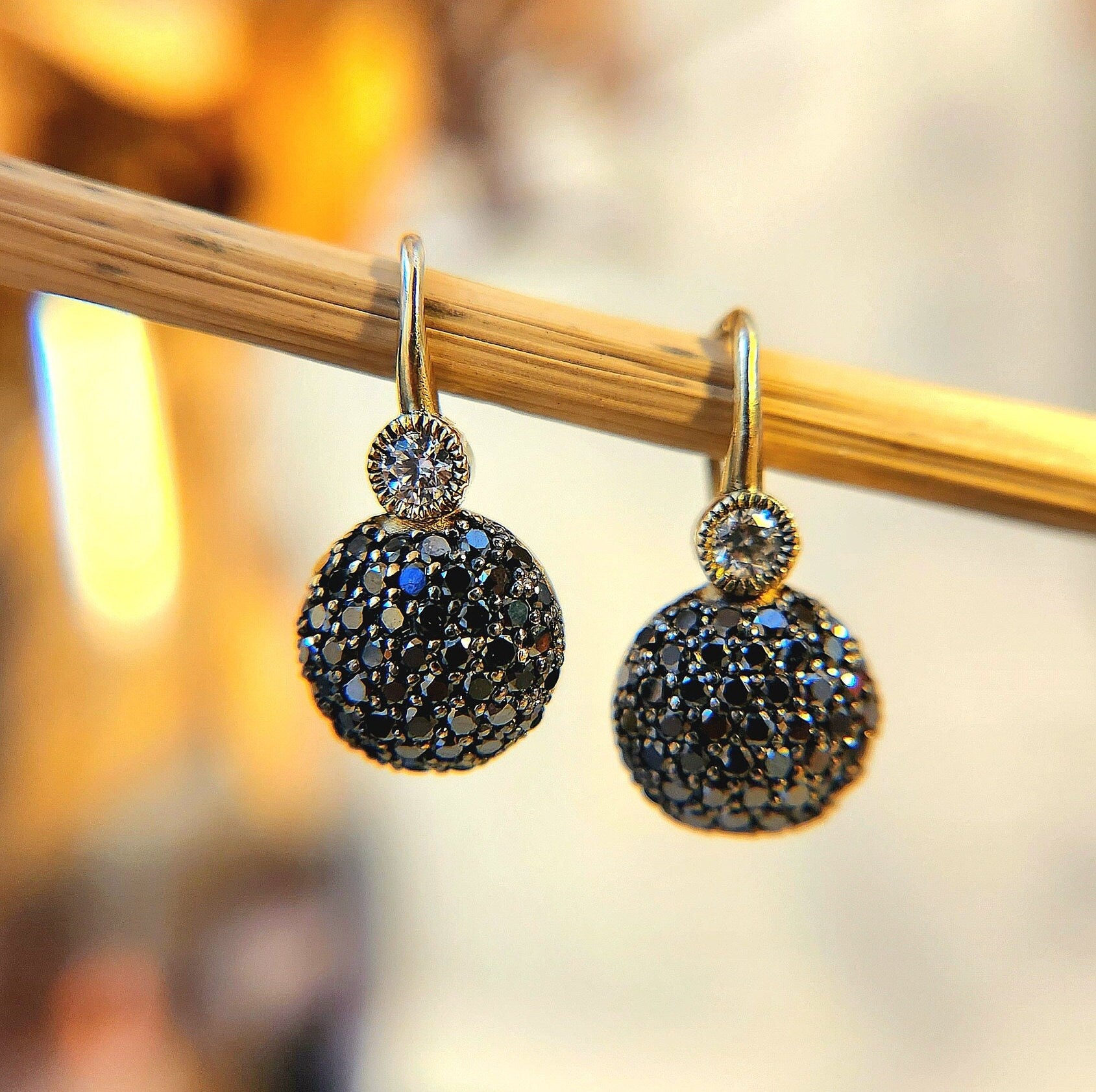 Black diamond dangling earring