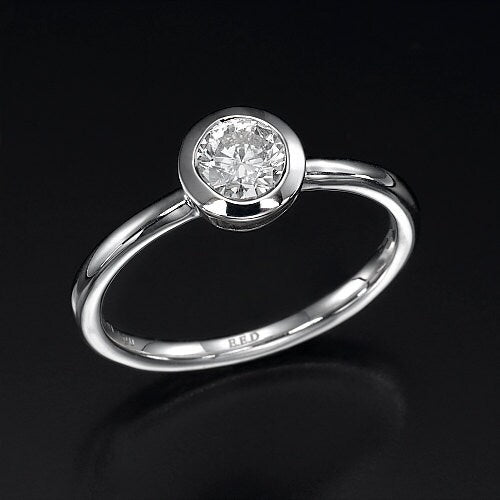 0.50CT diamond solitaire bezel ring